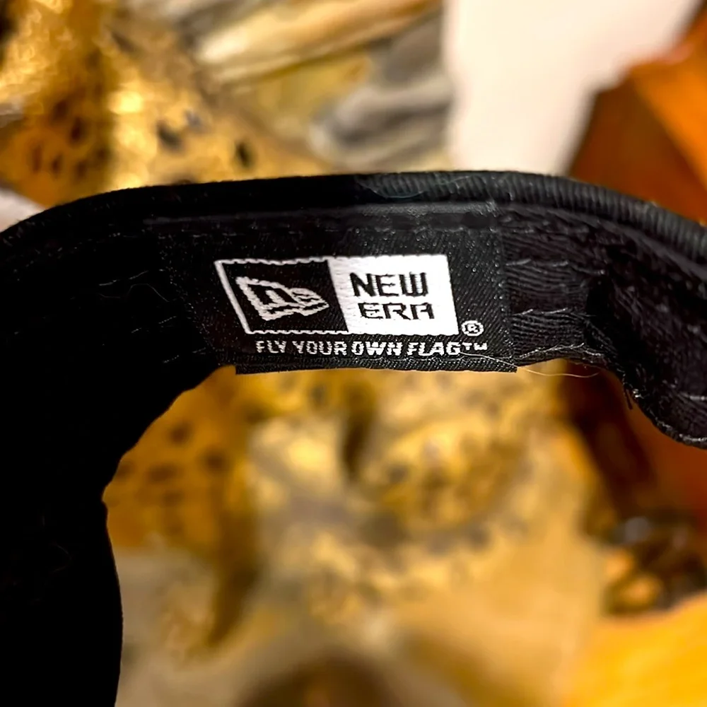 NFL Store. Saints Fleur De Lis Black and Gold. NWOT Visor. Adjustable.